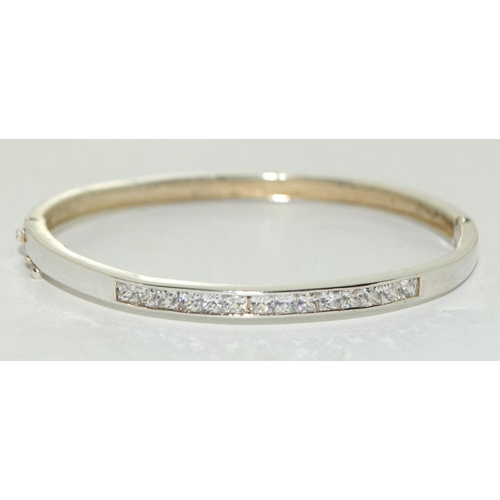 213 - Sparkly Princess cut CZ 925 silver bangle.