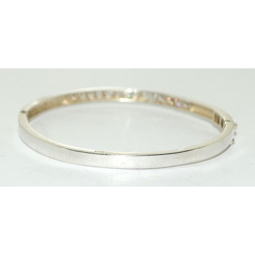 213 - Sparkly Princess cut CZ 925 silver bangle.