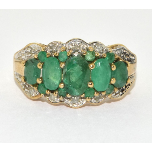 305 - 9ct gold ladies Diamond and Emerald ring H/M as diamond size M