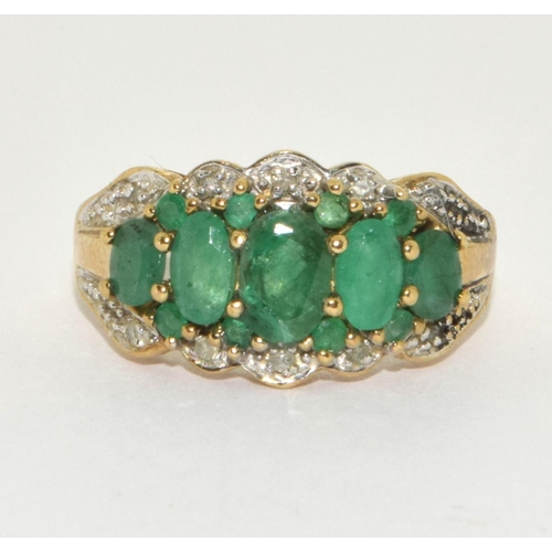 305 - 9ct gold ladies Diamond and Emerald ring H/M as diamond size M