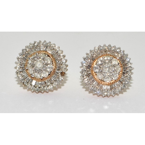 506 - 9ct gold Diamond earrings set in the round halo design with round and baguette stones 1 missing