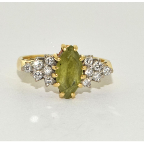 454 - 18ct gold ladies Peridot and Diamond ring in a diamond shape size M