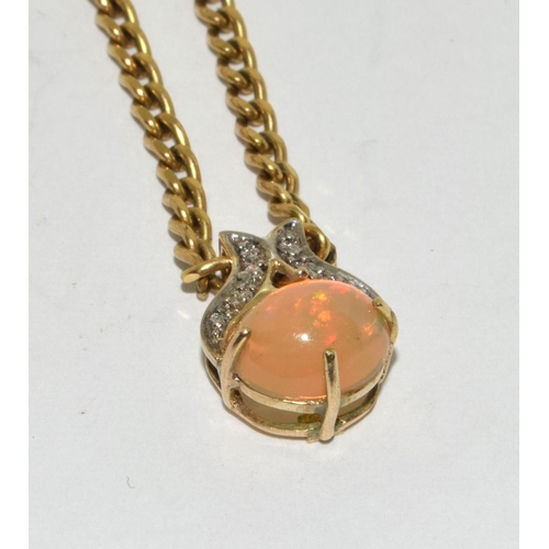 434 - 9ct gold Fire Opal and Diamond pendant necklace chain is 45cm 9.5g