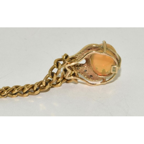 434 - 9ct gold Fire Opal and Diamond pendant necklace chain is 45cm 9.5g