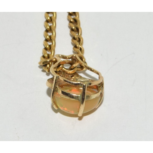 434 - 9ct gold Fire Opal and Diamond pendant necklace chain is 45cm 9.5g