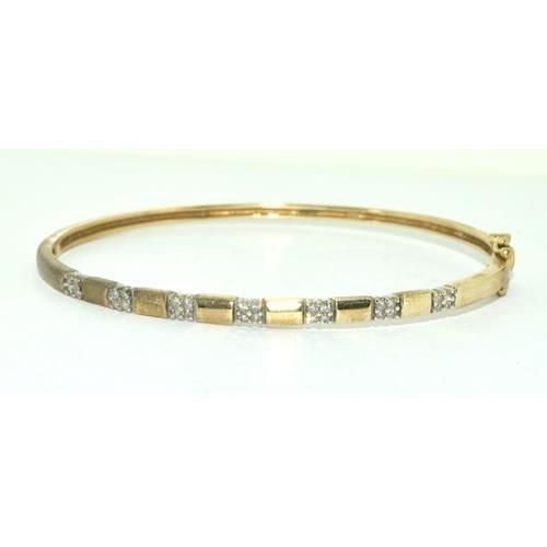 364 - 9ct gold Diamond set bangle 8.7g