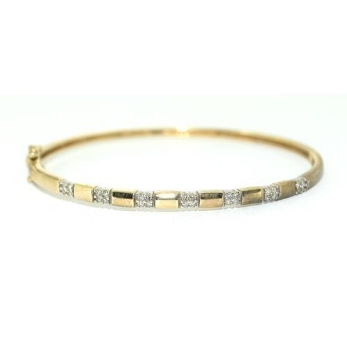 364 - 9ct gold Diamond set bangle 8.7g