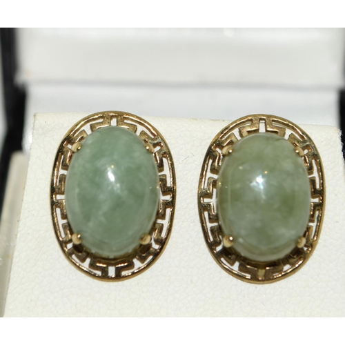 444 - Large 9ct gold and jade earrings 18mm by 13mm.