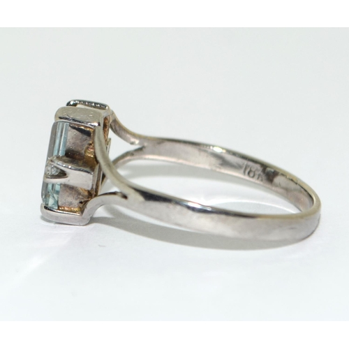 380 - 18ct white gold aquamarine and diamond ring Size N.