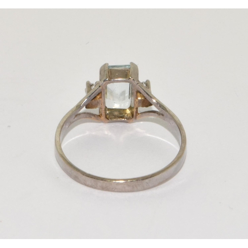 380 - 18ct white gold aquamarine and diamond ring Size N.