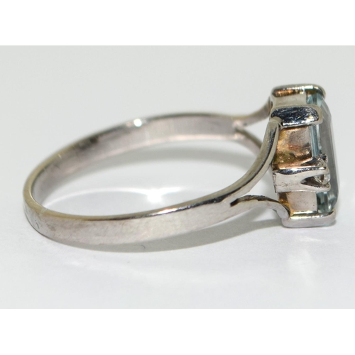 380 - 18ct white gold aquamarine and diamond ring Size N.