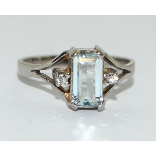 380 - 18ct white gold aquamarine and diamond ring Size N.