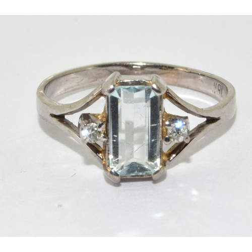 380 - 18ct white gold aquamarine and diamond ring Size N.