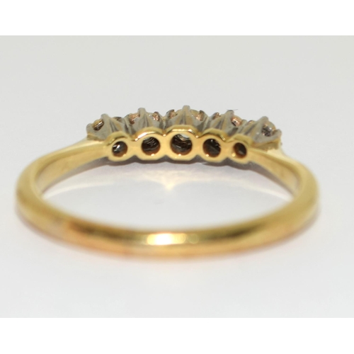 391 - Vintage heavy 18ct yellow gold and five stone diamond ring Size Q.