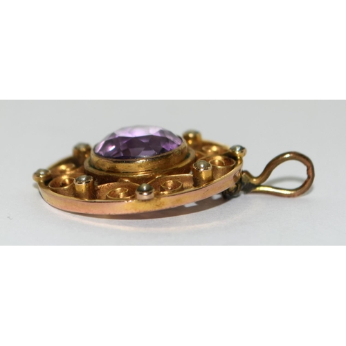 487 - Antique test as 9ct gold seed pearl and amethyst Lavaliere pendant.