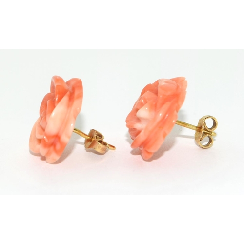 472 - Large 15mm hand carved natural angel skin coral and 18ct gold earrings.