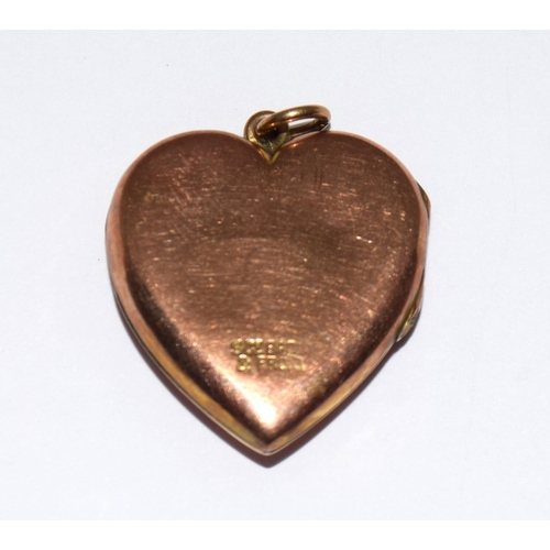 512 - Antique 9ct rose gold back and front and garnet heart shaped locket.