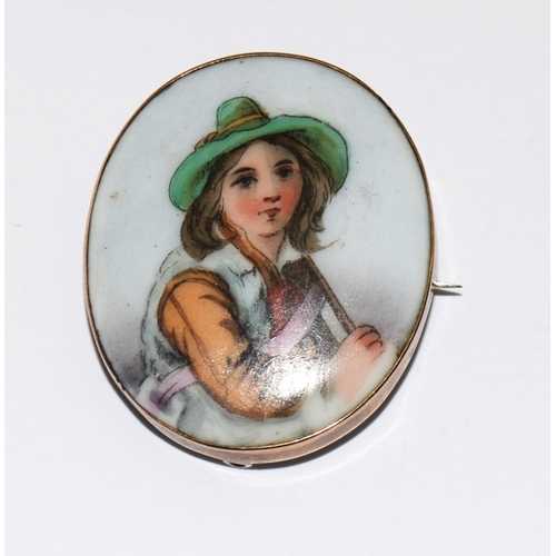 419 - Antique Victorian tests as 9ct gold painted porcelain brooch (boy)