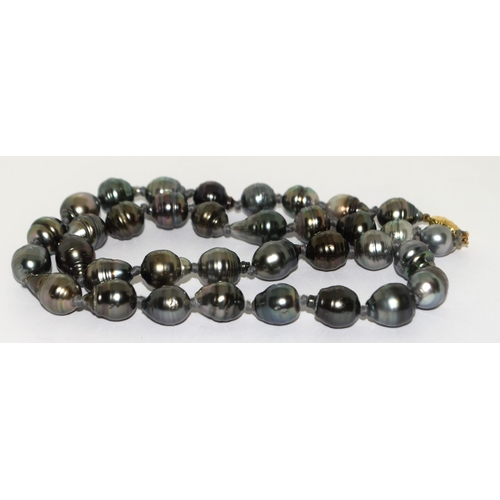 482 - A Real Tahitian grey south sea pearl necklace with 18ct gold clasp, 19