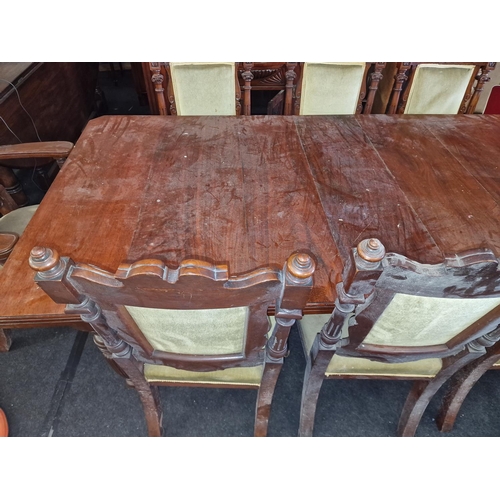 566 - Mahogany extending dining table on turned fluted supports with 2 leaves together 8 art nouveau carve... 