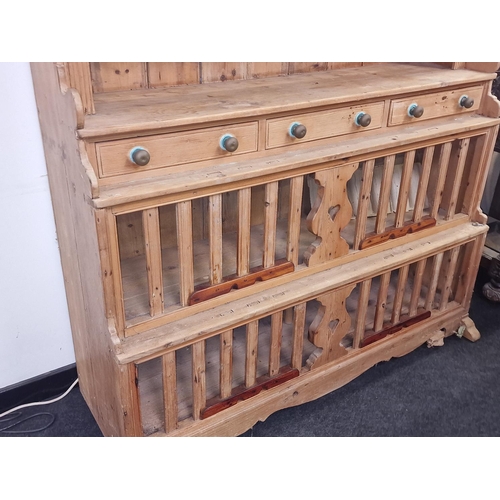 573 - Irish antique pine stepped multi purpose kitchen dresser having twin shelves over triple draws with ... 