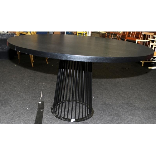 574 - Large circular dining table with solid ebonised to supported by black powdercoated metal carousel st... 