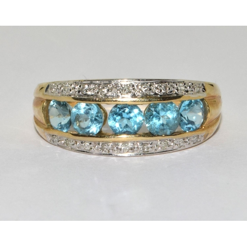 285 - 9ct gold ladies 5 stone Aquamarine and Diamond ring size Q