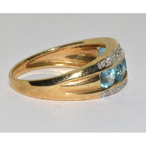 285 - 9ct gold ladies 5 stone Aquamarine and Diamond ring size Q