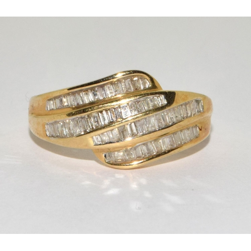 376 - 9ct gold ladies Diamond sweep ring set with Baguette cut Diamonds size N