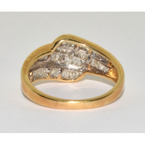 376 - 9ct gold ladies Diamond sweep ring set with Baguette cut Diamonds size N