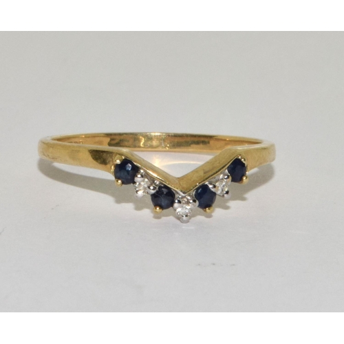 265 - 9ct gold ladies Diamond and sapphire V shape ring size P