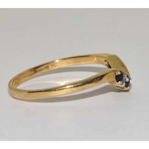 265 - 9ct gold ladies Diamond and sapphire V shape ring size P