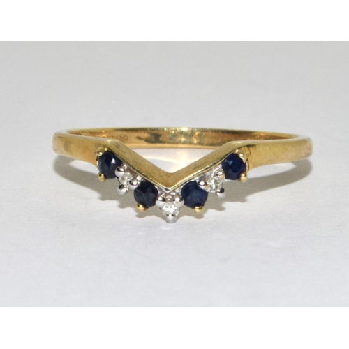 265 - 9ct gold ladies Diamond and sapphire V shape ring size P