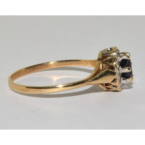 268 - 9ct gold ladies Diamond and Sapphire cluster ring size O