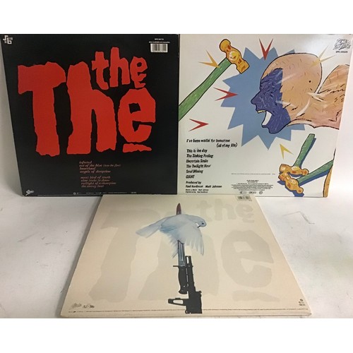 205 - THE THE VINYL LP RECORDS X 3. Titles here are as follows - ‘Mind Bomb’ complete with 2 posters , pho... 