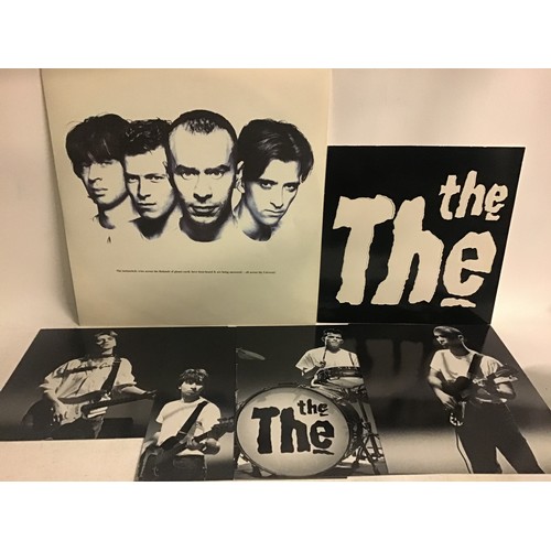 205 - THE THE VINYL LP RECORDS X 3. Titles here are as follows - ‘Mind Bomb’ complete with 2 posters , pho... 