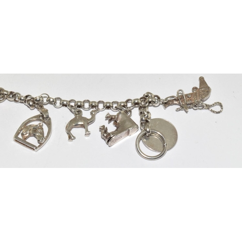 287 - Silver charm bracelet and 8 charms