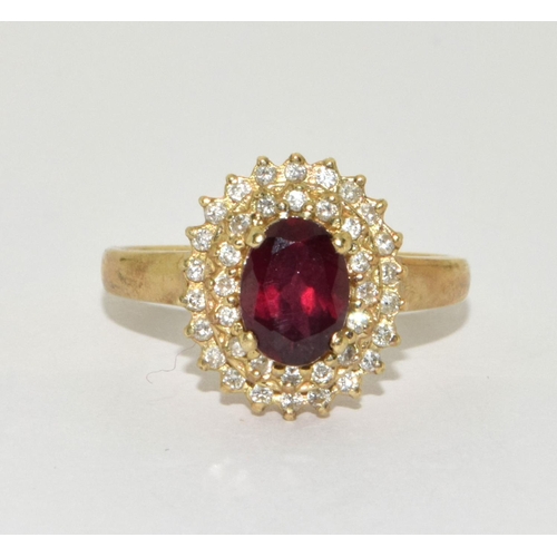 451 - 9ct gold ladies Halo garnet cluster ring size Q