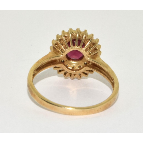 451 - 9ct gold ladies Halo garnet cluster ring size Q