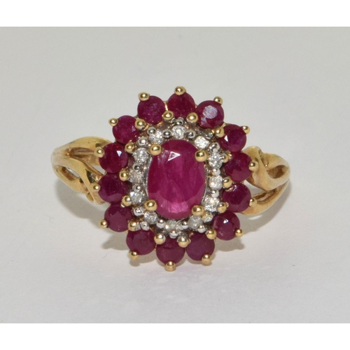 476 - 9ct gold ladies Ruby and Diamond statement ring size R