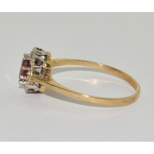 496 - 9ct gold ladies Pink Tourmaline and Diamond cluster ring size Q