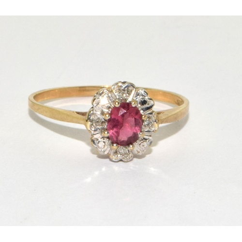 496 - 9ct gold ladies Pink Tourmaline and Diamond cluster ring size Q