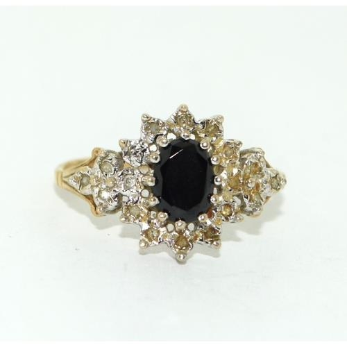 373 - 9ct gold ladies Diamond and Sapphire cluster ring Hall marked in ring as diamond size P