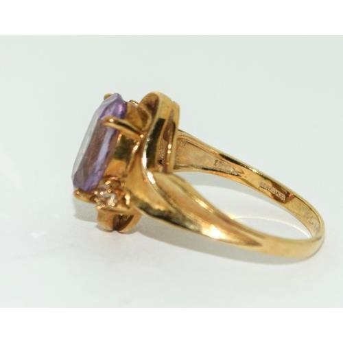 205 - 9ct gold ladies Diamond and Amethyst ring 3.6g size N