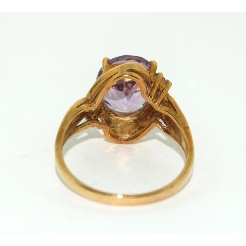 205 - 9ct gold ladies Diamond and Amethyst ring 3.6g size N