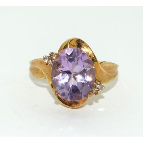 205 - 9ct gold ladies Diamond and Amethyst ring 3.6g size N