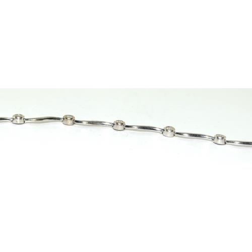 334 - 9ct white gold fancy link diamond bracelet H/M 0.25ct