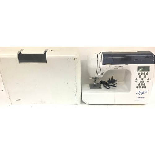 3 - Joy’s Homemaker electric sewing machine model No. PF8001.