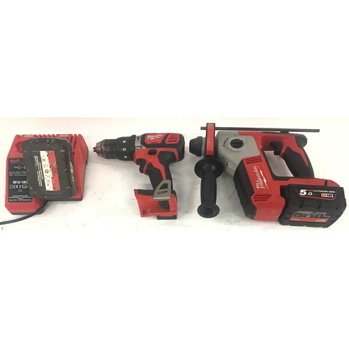 4 - Milwaukee hand drill and hammer drill with charger and 2 batteries.