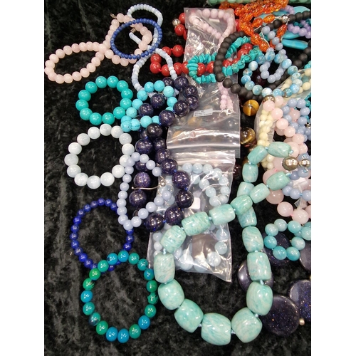 426 - Large quantity of beaded necklaces and bracelets to include Turquoise , etc